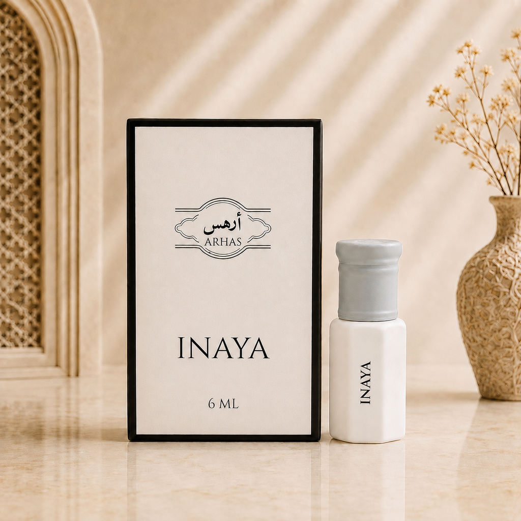 ARHAS Inaya attar oil 6ml roll-on bottle beside its retail box