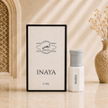 ARHAS Inaya attar oil 6ml roll-on bottle beside its retail box