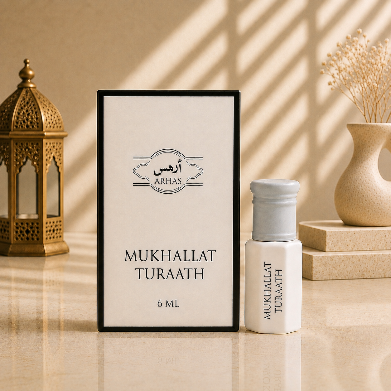 ARHAS Mukhallat Turaath attar oil 6ml roll-on bottle beside its retail box