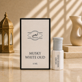 ARHAS Musky White Oud attar oil 6ml roll-on bottle beside its retail box