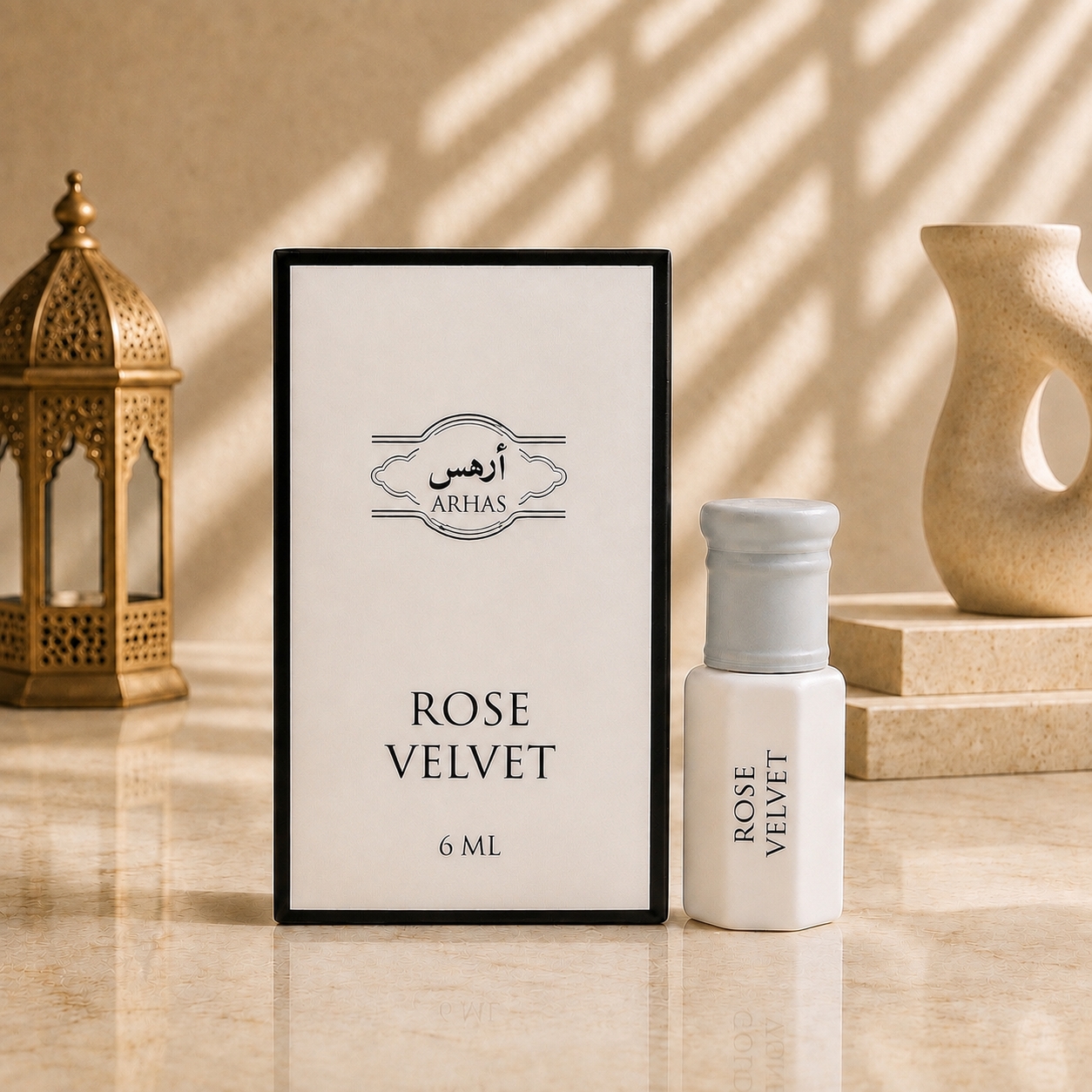 ARHAS Rose Velvet attar oil 6ml roll-on bottle beside its retail box