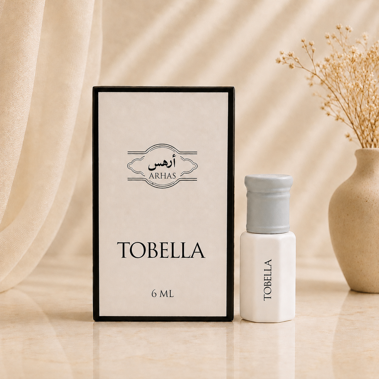 ARHAS Tobella attar oil 6ml roll-on bottle beside its retail box