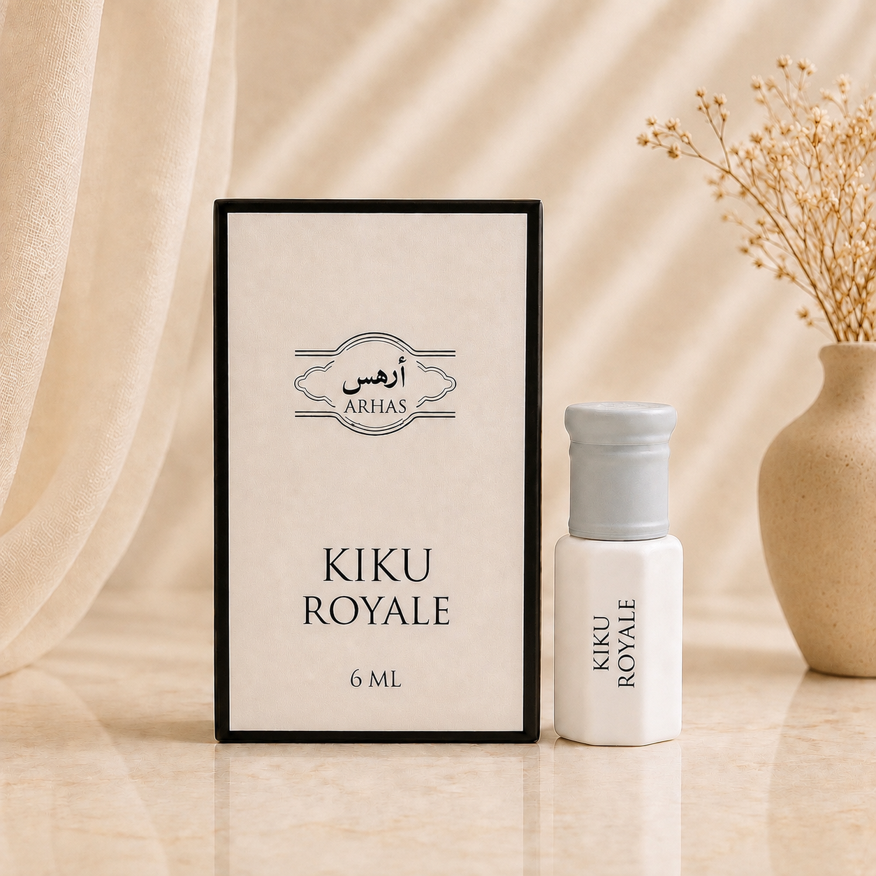 ARHAS Kiku Royale attar oil 6ml roll-on bottle beside its retail box