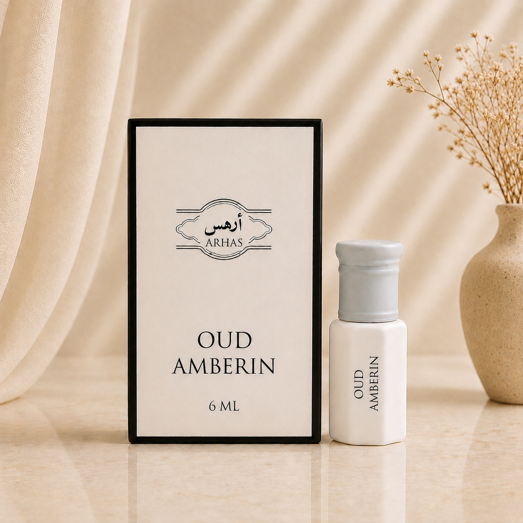 ARHAS Oud Amberin  attar oil 6ml roll-on bottle beside its retail box